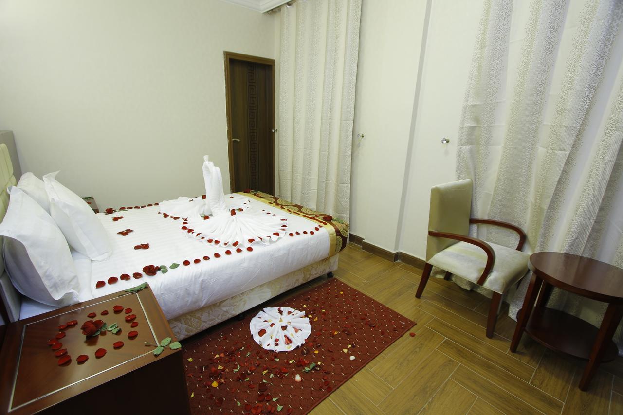 Guzara Hotel Addis Bagian luar foto