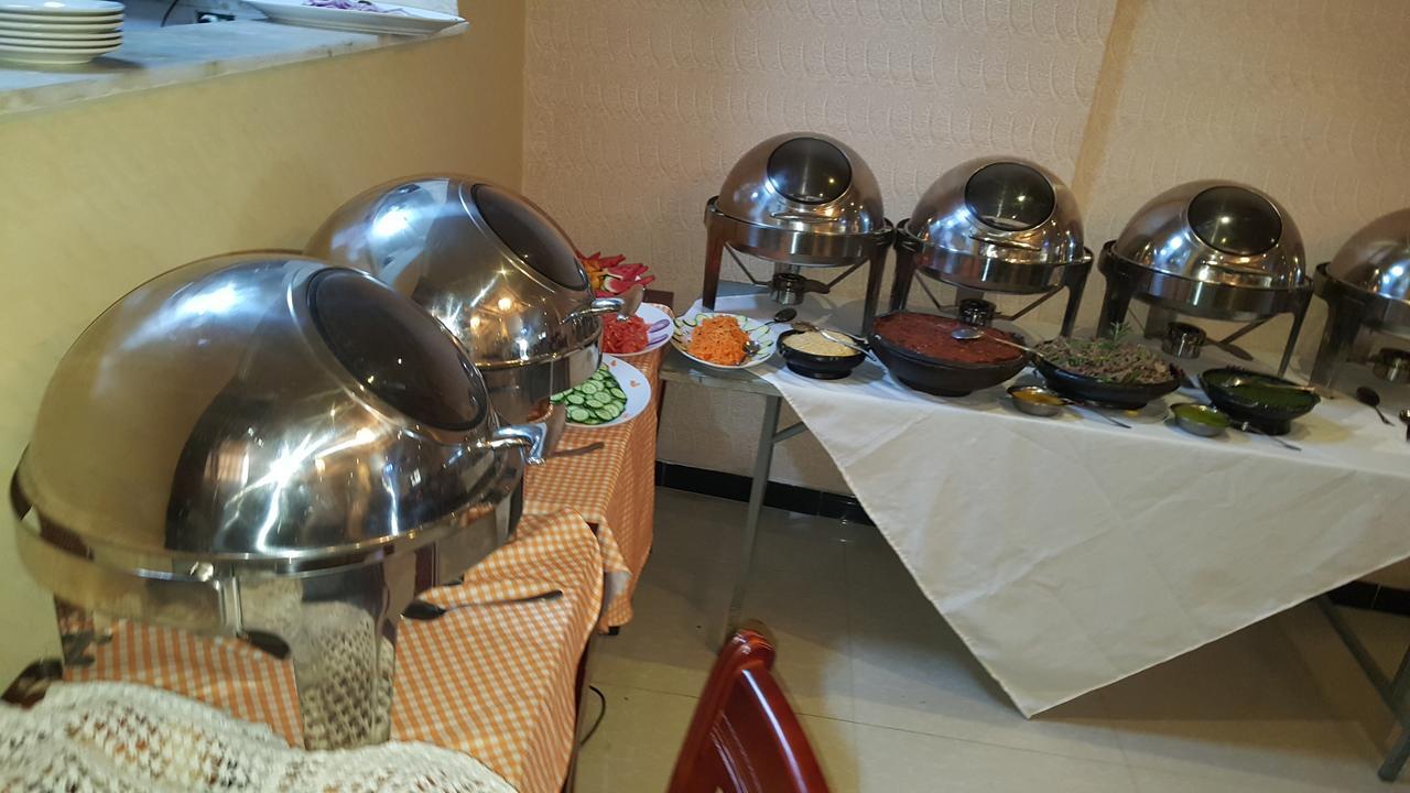 Guzara Hotel Addis Bagian luar foto